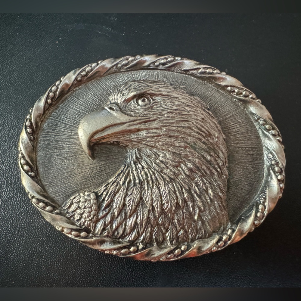 VINTAGE NWOT COLORADO SILVER STAR EAGLE PROFILE W/ ROPE BORDER BELT BUCKLE. OS